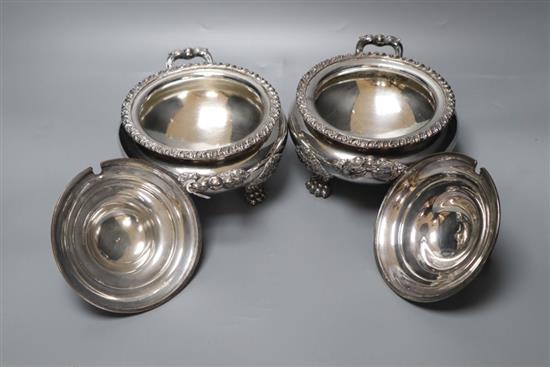 A pair of early 19th century Old Sheffield plate circular two-handled tureens and covers,